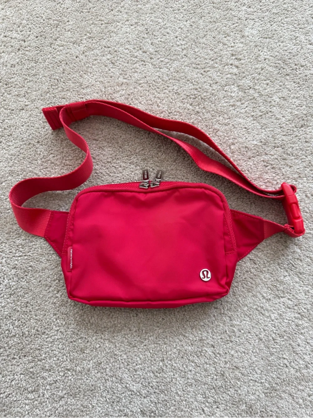 Lululemon Red Everywhere Belt Bag signature silver-toned zipper pulls